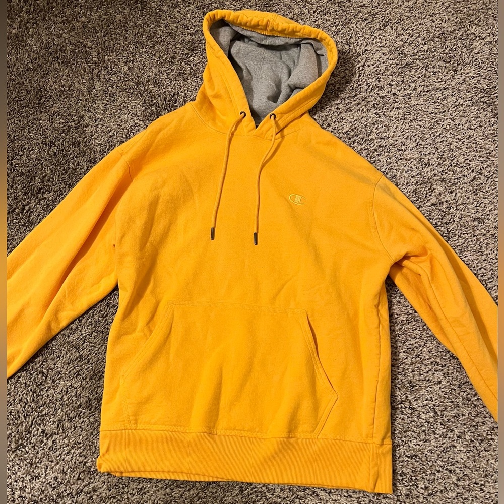 yellow champion hoodie, size medium